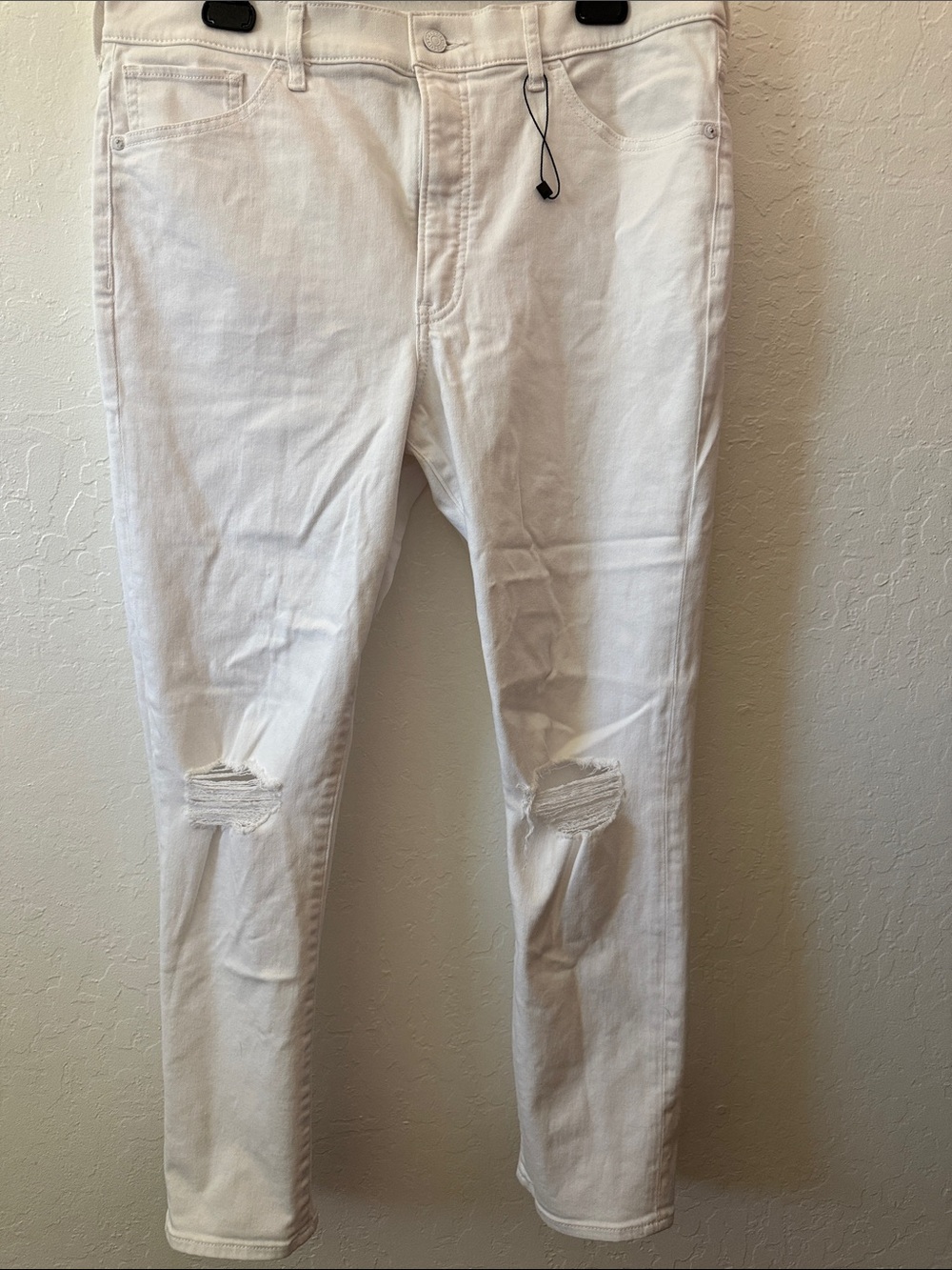 Express Men's White Skinny Jeans with Knee Distress